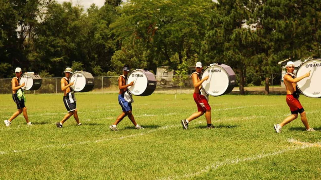 Marching bass drums in a line