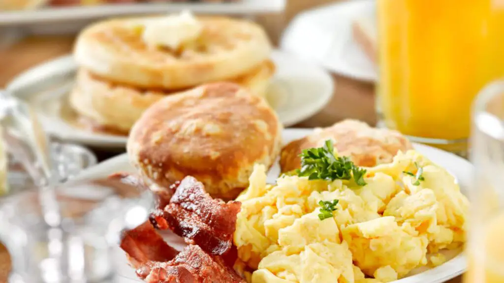 high protein breakfast with eggs bacon and biscuit