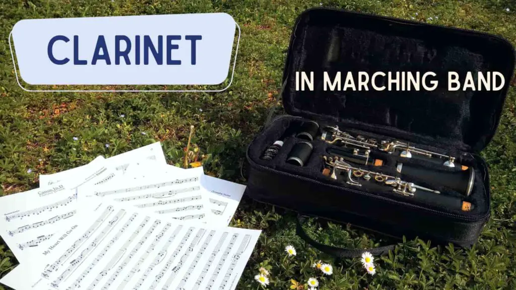 clarinet in a case on the grass with sheet music next to it